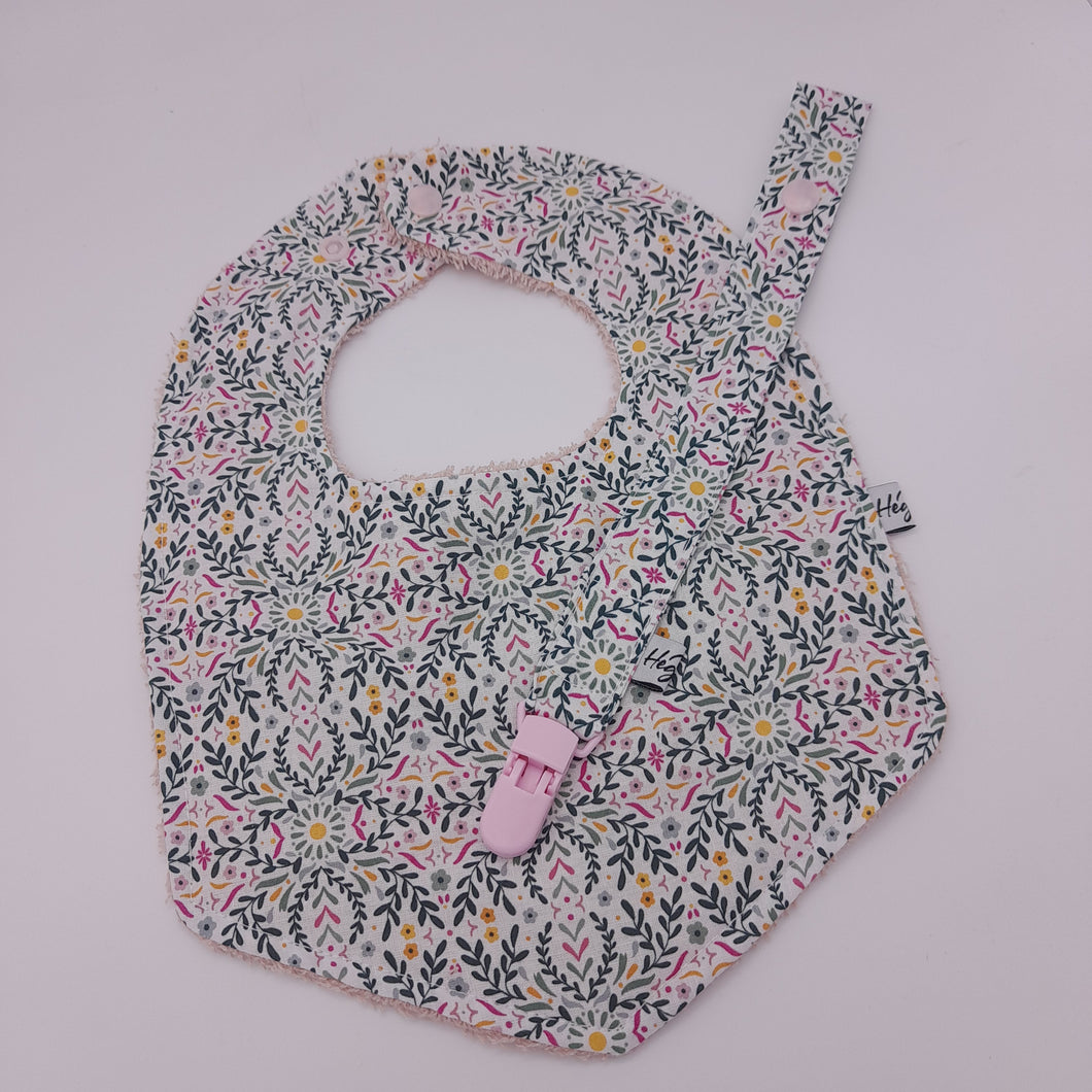 Pack Babero +chupetero flores pink