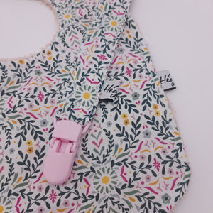 Pack Babero +chupetero flores pink
